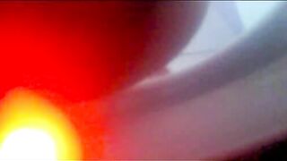 Girl shits into a toilet bowl