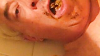 Woman covers herself in shit in the bathtub