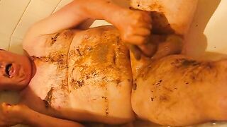 Woman covers herself in shit in the bathtub