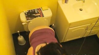 Asian hot lady shitting in the toilet