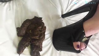 Big messy poop in front of a mirror