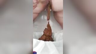 Filling the box with her lovely shit