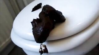 Girl shitting throug the blue jeans and tramples with feet