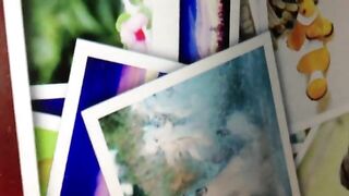 Girl drops a huge steaming shit on a pile of photos