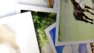 Girl drops a huge steaming shit on a pile of photos