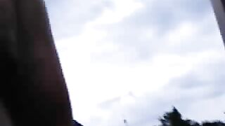 Woman eats a pile of shit outdoors