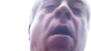 Woman eats a pile of shit outdoors