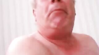 Old man puts a big turd in his mouth and licks it