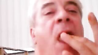 Old man puts a big turd in his mouth and licks it