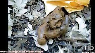 Gorgeous brunette gets naked for pooping in the forest