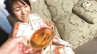 Beautiful Japanese hairy babe pissing in the glass