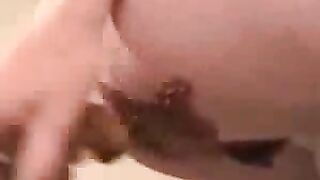 Beautiful looking MILF poops and toys