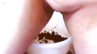 Shitting in a bowl and smearing it on boobs