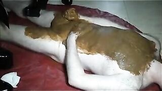 Naked smaal cock dude gets covered in shit