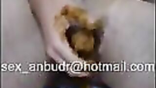 Woman shits and pisses on camera