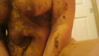 Busty slut rides cock while pooping