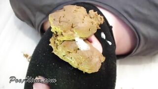 Girl takes a huge shit in a toilet and plays with it