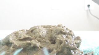 A big pile of shit with piss being mixed into it