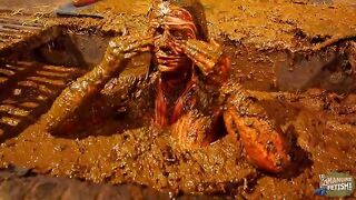 Betty has fun in the manure channel - bathing in the cowshit