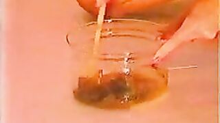 Retro Scat MILF smoking a cigarette while shitting