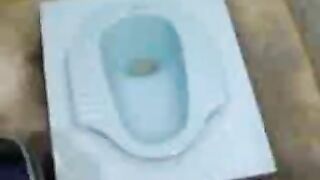 Woman fucks herself with a huge anal dildo