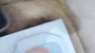 Woman fucks herself with a huge anal dildo