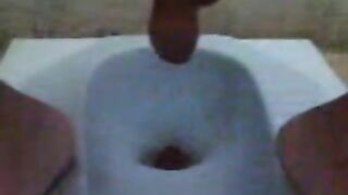 Girl takes a massive shit in a public toilet