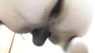 Girl shits in a bowl on the floor