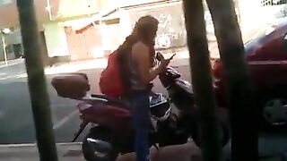 Girl squats on scooter and shits on seat