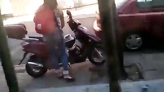 Girl squats on scooter and shits on seat