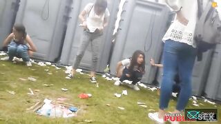Girl shits at festival with friend nearby