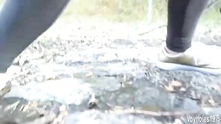 Woman squats and pisses on the ground