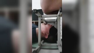 Chick pisses into a machine while her ass is on display