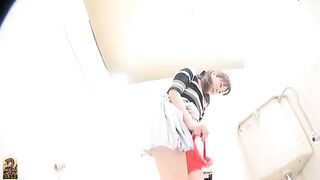 Girl squats and takes a shit into a toilet