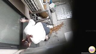 Woman takes a huge shit on the floor in the kitchen