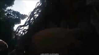 Woman takes a huge shit into a bag on top of plants