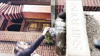 Girl takes a dump in a trash can outside