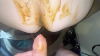 Woman digs out shit from her ass with her fingers