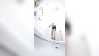 Babe squats and drops a huge shit in a toilet