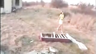 Girl takes a big shit on a white cloth and gets it all over her ass