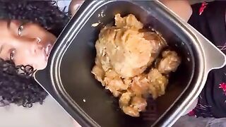 Girl lays on her back and eats shit out of a bowl