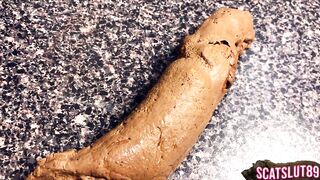 A woman takes a shit on the bathroom counter