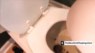 Woman lays on a white pad and poops, she then eats it up