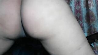 Girl squats down and pisses into her own hand