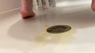 Hands massage a fresh pile of shit