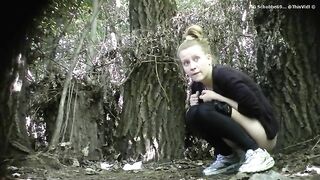 Woman taking a huge shit outside in the woods