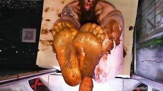 Woman covers her face and body in her own shit.
