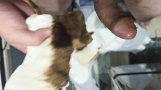 Girl holds a huge blob of shit in her hand