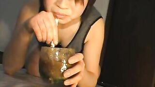Girl drinks piss from a glass