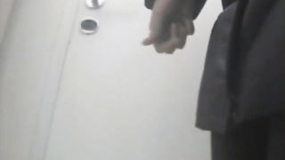 Peeing in a public bathroom